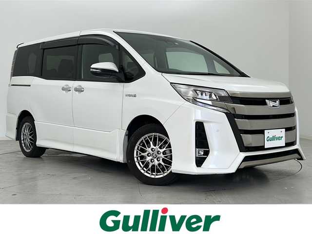トヨタ ノア ハイブリッド Si ダブルバイビーⅡ 宮城県 2020(令2)年 6.3万km ホワイトパールクリスタルシャイン トヨタセーフティーセンス/・プリクラッシュセーフティ/・レーンディパーチャーアラート/・オートハイビーム/純正12インチフリップダウンモニター/純正9インチナビ/・CD.DVD.SD.BT/フルセグTV/バックモニター/ハーフレザーシート/・前席シートヒーター/LEDヘッドライト/フォグランプ/アイドリングストップ/横滑り防止装置/ビルトインETC/ステアリングスイッチ/プッシュスタート/スマートキー/純正16インチアルミホイール/純正フロアマット/後席ロールサンシェード/シートバックテーブル