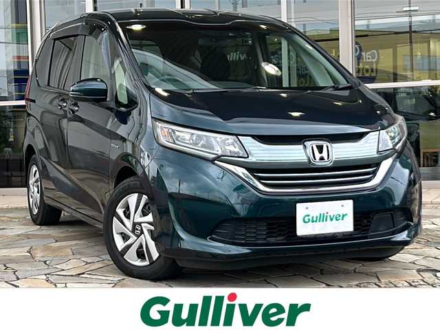 ホンダ フリード＋ ハイブリット G ホンダセンシング 静岡県 2019(令1)年 5.7万km フォレストグリーンパール 純正ナビ/・CD/DVD/・FM/AM/・TV/・SD/・Bluetooth/ホンダセンシング/●衝突軽減ブレーキ〈CMBS〉/●誤発進抑制機能/●ACC〈アダプティブ・クルーズ・コントロール〉/●LKAS〈車線維持支援システム〉/●歩行者事故低減ステアリング/●路外逸脱抑制機能/●先行車発進お知らせ機能/●標識認識機能/主要装備/・バックカメラ/・両側パワースライドドア/・ＥＴＣ/・ＬＥＤヘッドライト/・アクティブコーナリングライト/・ドライブレコーダー/・純正フロアマット/・横滑り防止装置