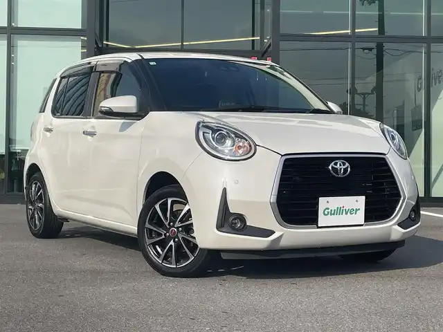トヨタ パッソ モーダ　Gパッケージ 愛媛県 2020(令2)年 1.6万km パールホワイトⅢ 純正ナビ（Bluetooth/SD/CD/DVD/フルセグTV)/バックカメラ/ビルドインETC/前方ドライブレコーダー/社外15インチアルミホイール/純正フロアマット/純正ドアバイザー/LEDヘッドライト/フォグランプ/オートマチックハイビーム/パーキングセンサー/ABS/横滑り防止装置/衝突被害軽減ブレーキ/電動格納ミラー/プッシュスタート/スマートキー