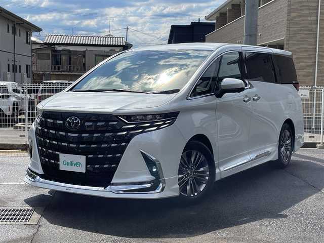 トヨタ アルファード Z 福島県 2025(令7)年 0.1万km プラチナホワイトパールマイカ ワンオーナー/ディスプレイオーディオPlus/AM/FM/BT/USB/HDMI/Miracast/フルセグTV/MODELLISTA エアロパーツセット/（REGAL DIGNITY STYLE）/左右独立ムーンルーフ/13.2型有機EL後席ディスプレイ/デジタルインナーミラー/パノラミックビューモニター/トヨタセーフティセンス/レーダークルーズコントロール/クリアランスソナー/ブラインドスポットモニター/両側パワースライドドア/パワーバックドア/合成皮革ブラックレザーシート/パワーシート/シートヒーター/エアシート/ステアリングヒーター/オートハイビーム/3眼LEDヘッドライト/ビルトインETC 2.0/USB充電ポート/おくだけ充電/フロアマット