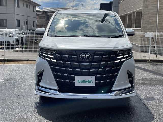 トヨタ アルファード Z 福島県 2025(令7)年 0.1万km プラチナホワイトパールマイカ ワンオーナー/ディスプレイオーディオPlus/AM/FM/BT/USB/HDMI/Miracast/フルセグTV/MODELLISTA エアロパーツセット/（REGAL DIGNITY STYLE）/左右独立ムーンルーフ/13.2型有機EL後席ディスプレイ/デジタルインナーミラー/パノラミックビューモニター/トヨタセーフティセンス/レーダークルーズコントロール/クリアランスソナー/ブラインドスポットモニター/両側パワースライドドア/パワーバックドア/合成皮革ブラックレザーシート/パワーシート/シートヒーター/エアシート/ステアリングヒーター/オートハイビーム/3眼LEDヘッドライト/ビルトインETC 2.0/USB充電ポート/おくだけ充電/フロアマット