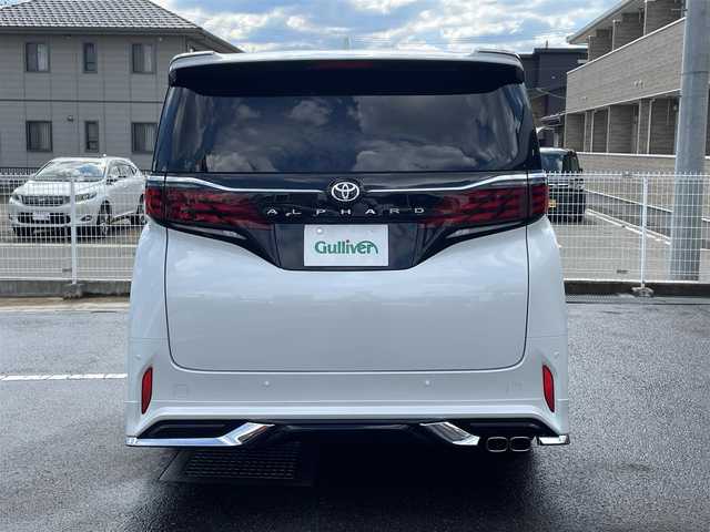 トヨタ アルファード Z 福島県 2025(令7)年 0.1万km プラチナホワイトパールマイカ ワンオーナー/ディスプレイオーディオPlus/AM/FM/BT/USB/HDMI/Miracast/フルセグTV/MODELLISTA エアロパーツセット/（REGAL DIGNITY STYLE）/左右独立ムーンルーフ/13.2型有機EL後席ディスプレイ/デジタルインナーミラー/パノラミックビューモニター/トヨタセーフティセンス/レーダークルーズコントロール/クリアランスソナー/ブラインドスポットモニター/両側パワースライドドア/パワーバックドア/合成皮革ブラックレザーシート/パワーシート/シートヒーター/エアシート/ステアリングヒーター/オートハイビーム/3眼LEDヘッドライト/ビルトインETC 2.0/USB充電ポート/おくだけ充電/フロアマット