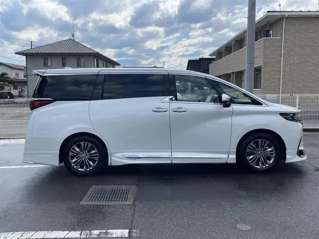 トヨタ アルファード Z 福島県 2025(令7)年 0.1万km プラチナホワイトパールマイカ ワンオーナー/ディスプレイオーディオPlus/AM/FM/BT/USB/HDMI/Miracast/フルセグTV/MODELLISTA エアロパーツセット/（REGAL DIGNITY STYLE）/左右独立ムーンルーフ/13.2型有機EL後席ディスプレイ/デジタルインナーミラー/パノラミックビューモニター/トヨタセーフティセンス/レーダークルーズコントロール/クリアランスソナー/ブラインドスポットモニター/両側パワースライドドア/パワーバックドア/合成皮革ブラックレザーシート/パワーシート/シートヒーター/エアシート/ステアリングヒーター/オートハイビーム/3眼LEDヘッドライト/ビルトインETC 2.0/USB充電ポート/おくだけ充電/フロアマット