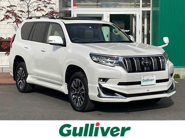 トヨタ ランドクルーザー プラド TX Lパッケージ 青森県 2023(令5)年 3.6万km ホワイトパールクリスタルシャイン 4WD/ワンオーナー/アルパイン9インチナビ・フルセグTV/CD・DVD・Bluetooth・SD/バックカメラ/サンルーフ/ベージュレザーシート/前席パワーシート/前席エアシート・シートヒーター/3列目シート電動格納/セーフティセンス/プリクラッシュセーフティ/レーンディパーチャーアラート/オートマチックハイビーム/レーダークルーズコントロール/前後ドライブレコーダー/LEDヘッドライト/LEDフォグランプ/モデリスタF/Rエアロ/OPブラックルーフレール/OP純正19インチアルミ/スペアキー/保証書・取説書