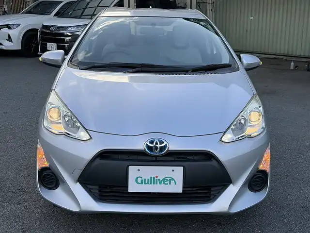 トヨタ アクア L 京都府 2015(平27)年 11.3万km シルバーM ・ワンオーナー/・純正オーディオ/　CD再生/　FM/AM/・電格ミラー/・EVモード/・ECOモード/・スペアキー/・純正マット/・取説/保証書