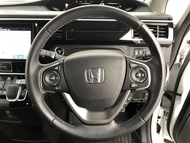 ホンダ ステップワゴン スパーダ eHEV G ホンダS 愛知県 2022(令4)年 4.5万km プラチナホワイトパール １０インチ純正ナビ　/フリップダウンモニター　/アドバンスドルームミラー　/バックカメラ　/衝突軽減ブレーキ　/ＨＤＭＩ／ＵＳＢ　/両側パワースライドドア　/ＥＴＣ２．０　/前後ドラレコ　/電子パーキング　/ＬＥＤオートライト　/スマートキー