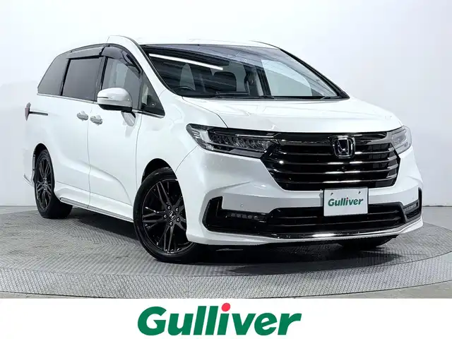 ホンダ オデッセイ ハイブリッド e:HEVアブソルート EX 大阪府 2021(令3)年 2.1万km プラチナホワイトパール 【輸送中の事故により処理中につき販売不可】ホンダセンシング　全方位カメラ　純正ナビＴＶ　レーダークルコン　パークアシスト　両側パワスラ　ハーフレザー　衝突軽減　ＥＴＣ　シートヒーター　ドラレコ　レーンアシスト　パワーシート　電動リアゲート