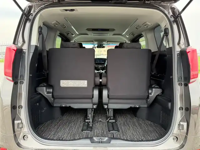 トヨタ アルファード S Aパッケージ 富山県 2019(令1)年 4.9万km グラファイトM 4WD/純正10型ナビ(BT/CD/DVD)/フルセグTV/パワースライドドア(両側)/バックカメラ/ビルトインETC2.0/純正ドライブレコーダー/純正12.1型後席ディスプレイ/レーダークルーズコントロール/セーフティセンス/・プリクラッシュセーフティ/・ロードサインアシスト/・レーントレーシングアシスト/・オートマチックハイビーム/ブラック加飾2眼LEDヘッドランプ/デュアルオートエアコン/木目調/革巻きコンビステアリング/助手席マニュアルオットマン/2列目リラックスキャプテンシート/純正18インチアルミホイール/スマートエントリー/プッシュスタートシステム/禁煙車