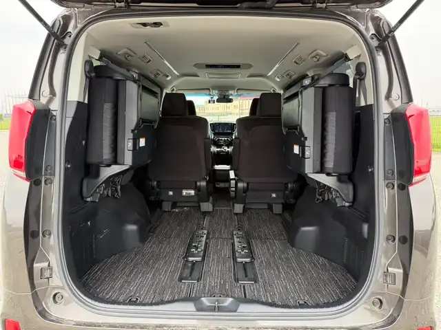 トヨタ アルファード S Aパッケージ 富山県 2019(令1)年 4.9万km グラファイトM 4WD/純正10型ナビ(BT/CD/DVD)/フルセグTV/パワースライドドア(両側)/バックカメラ/ビルトインETC2.0/純正ドライブレコーダー/純正12.1型後席ディスプレイ/レーダークルーズコントロール/セーフティセンス/・プリクラッシュセーフティ/・ロードサインアシスト/・レーントレーシングアシスト/・オートマチックハイビーム/ブラック加飾2眼LEDヘッドランプ/デュアルオートエアコン/木目調/革巻きコンビステアリング/助手席マニュアルオットマン/2列目リラックスキャプテンシート/純正18インチアルミホイール/スマートエントリー/プッシュスタートシステム/禁煙車