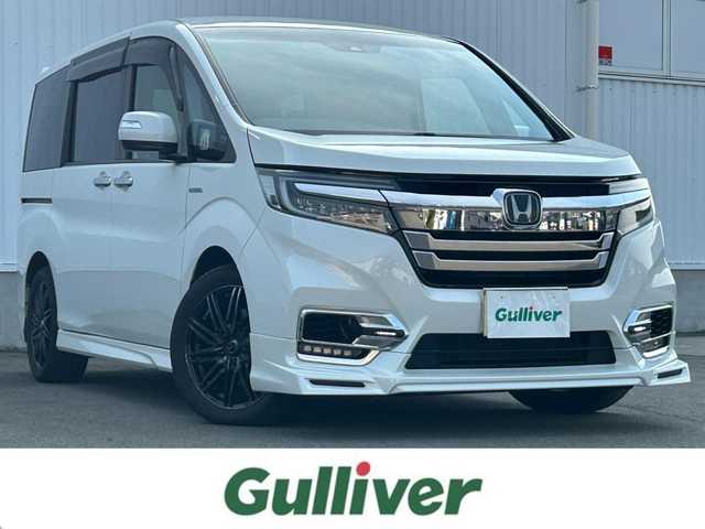 ホンダ ステップワゴン スパーダ ハイブリッド G EX ホンダセンシング 愛媛県 2018(平30)年 11.6万km プラチナホワイトパール 両側パワースライドドア/ホンダセンシング/純正メモリナビ/フルセグテレビ/ドライブレコーダー/クルーズコントロール/アイドリングストップ/ETC2.0/Bluetooth接続/AppleCarPlay/社外後席モニター/レーンキープアシスト/横滑り防止装置/バックカメラ/オートライト/オートマチックハイビーム/純正フロアマット/社外アルミホイール/ドアバイザー/スマートキー/プッシュスタート/ABS