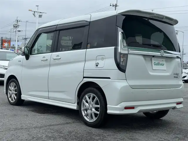 スズキ ソリオ バンディット HV MV 徳島県 2023(令5)年 2.7万km ピュアホワイトP 純正ナビ・フルセグＴＶ・ＣＤ・DVD再生・Bluetooth・USB接続・AMFMチューナー/衝突被害軽減システム/コーナーセンサー/車線逸脱警報装置/前席シートヒーター/プッシュスタート・スマートキー/社外15インチアルミホイール/LEDヘッドライト・フォグランプ/ダブル・サイドエアバック/純正フロアマット/ウィンカーミラー