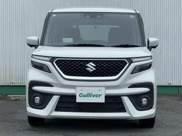 スズキ ソリオ バンディット HV MV 徳島県 2023(令5)年 2.7万km ピュアホワイトP 純正ナビ・フルセグＴＶ・ＣＤ・DVD再生・Bluetooth・USB接続・AMFMチューナー/衝突被害軽減システム/コーナーセンサー/車線逸脱警報装置/前席シートヒーター/プッシュスタート・スマートキー/社外15インチアルミホイール/LEDヘッドライト・フォグランプ/ダブル・サイドエアバック/純正フロアマット/ウィンカーミラー