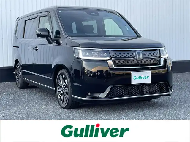 ホンダ ステップワゴン スパーダ eHEV プレミアムライン 千葉県 2024(令6)年 0.5万km クリスタルブラックパール 純正11.4インチメーカーナビ/(CD/DVD/BT/フルセグTV)/全方位カメラ/ホンダセンシング/衝突被害軽減システム/車線逸脱警報/レーダークルーズコントロール/ハーフレザーシート/両側パワースライドドア/横滑り防止装置/ETC/LEDヘッドライト/フォグランプ/オートライト/ウィンカーミラー/電動格納ミラー/純正17インチAW/シートヒーター/パワーバックドア/電子パーキングブレーキ/オートホールドスイッチ/プッシュスタート/スマートキー/フロアマット/ドアバイザー/スペアキー/取扱説明書/保証書