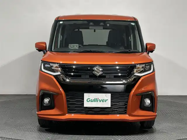 スズキ ソリオ HV SZ 愛媛県 2023(令5)年 1.3万km フレイムオレンジPM ・１０型ナビ/（フルセグＴＶ・ＢＴ・ＣＤ・ＤＶＤ・ＳＤ・ＦＭ・ＡＭ・ＵＳＢ）/・全方位カメラ　/・前後ドラレコ　/・両側パワースライドドア　/・ＤＮ席シートヒーター　/・ＵＳＢ充電　/・レーダークルーズコントロール/・レーンキープアシスト/・ヘッドアップディスプレイ/・サーキュレーター
