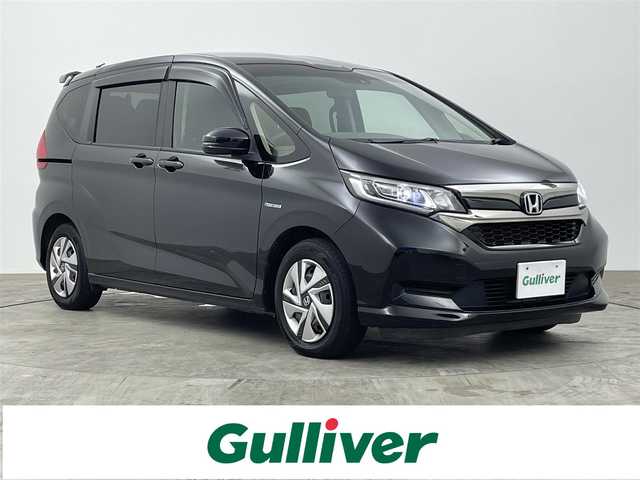 ホンダ フリード ハイブリット G ホンダセンシング 神奈川県 2021(令3)年 8.7万km クリスタルブラックパール 純正ナビ/フルセグ/DVD/Bluetooth/バックカメラ/両側パワスラ/ホンダセンシング/レーダークルーズコントロール/前後ドラレコ/ビルトインETC/前席シートヒーター/オートLEDライト/純正フロアマット/スマートキーX2/保証書