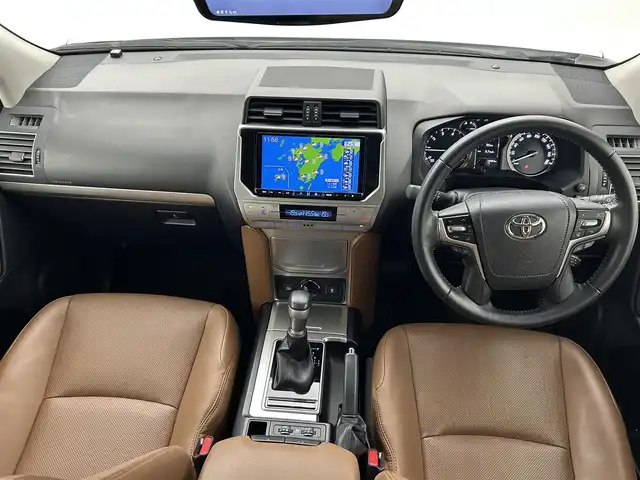 トヨタ ランドクルーザー プラド TX-L 70thアニバーサリーLTD 熊本県 2022(令4)年 2.5万km 白 アルパインナビ（ＣＤ・ＤＶＤ・フルセグ・ＢＴ・ＡｐｐｌＣａｒＰｌａｙ・AndroidAuto）/バックカメラ　/前後ドライブレコーダー　/レーダークルーズコントロール/ビルトインＥＴＣ２．０　/前後クリアランスソナー　/前席シートヒーター　/前席エアーシート/前席パワーシート/衝突軽減ブレーキ/レーンキープアシスト/横滑り防止/パーキングアシスト/社外フロアマット/純正１８インチAW/オートライト/オートマチックハイビーム/LEDヘッドライト/スマートキー/プッシュスタート/スペアキー1本/保証書/取扱説明書