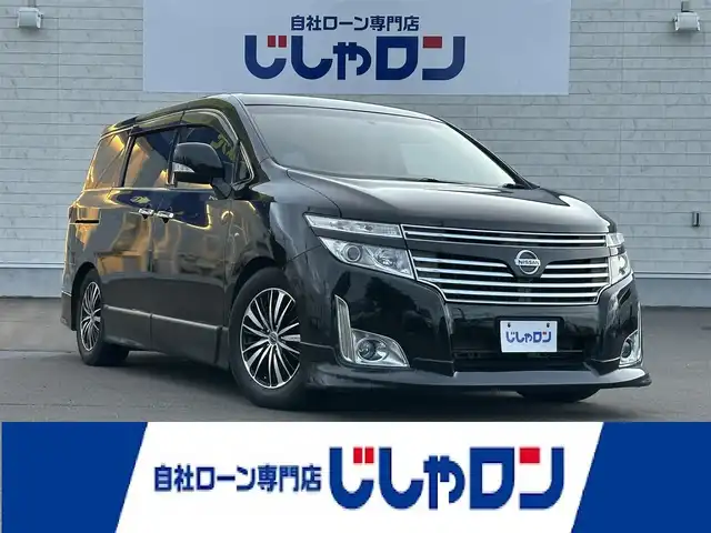 日産 エルグランド 250ハイウェイスター 道北・旭川 2012(平24)年 12.5万km ファントムブラック (株)IDOMが運営する【じしゃロン旭川店】の自社ローン専用車両になります。こちらは現金またはオートローンご利用時の価格です。自社ローンご希望の方は別途その旨お申付け下さい/　/・純正ナビ(CD/DVD/BT/SD/フルセグ)/・バックカメラ/・ETC/・両側パワースライドドア/・電動格納ウィンカーミラー/・フロントデアイサー/・リアデフォッガー/・オートライト/・プッシュスタート/・スマートキー1個/・フォグランプ/・現車装着スタッドレスタイヤ 純正AW225/60R17/・取扱説明書