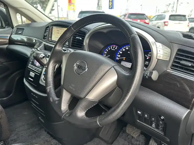 日産 エルグランド 250ハイウェイスター 道北・旭川 2012(平24)年 12.5万km ファントムブラック (株)IDOMが運営する【じしゃロン旭川店】の自社ローン専用車両になります。こちらは現金またはオートローンご利用時の価格です。自社ローンご希望の方は別途その旨お申付け下さい/　/・純正ナビ(CD/DVD/BT/SD/フルセグ)/・バックカメラ/・ETC/・両側パワースライドドア/・電動格納ウィンカーミラー/・フロントデアイサー/・リアデフォッガー/・オートライト/・プッシュスタート/・スマートキー1個/・フォグランプ/・現車装着スタッドレスタイヤ 純正AW225/60R17/・取扱説明書