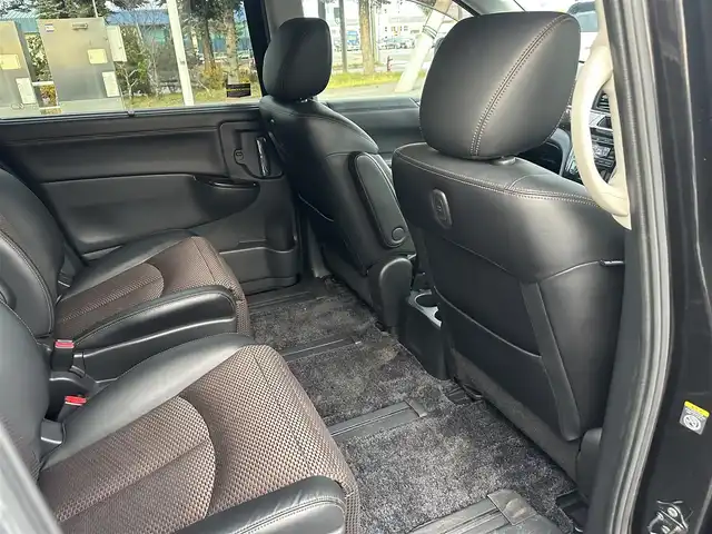 日産 エルグランド 250ハイウェイスター 道北・旭川 2012(平24)年 12.5万km ファントムブラック (株)IDOMが運営する【じしゃロン旭川店】の自社ローン専用車両になります。こちらは現金またはオートローンご利用時の価格です。自社ローンご希望の方は別途その旨お申付け下さい/　/・純正ナビ(CD/DVD/BT/SD/フルセグ)/・バックカメラ/・ETC/・両側パワースライドドア/・電動格納ウィンカーミラー/・フロントデアイサー/・リアデフォッガー/・オートライト/・プッシュスタート/・スマートキー1個/・フォグランプ/・現車装着スタッドレスタイヤ 純正AW225/60R17/・取扱説明書