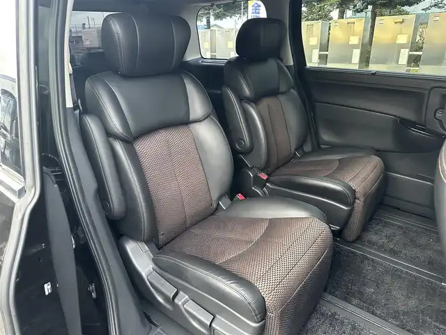 日産 エルグランド 250ハイウェイスター 道北・旭川 2012(平24)年 12.5万km ファントムブラック (株)IDOMが運営する【じしゃロン旭川店】の自社ローン専用車両になります。こちらは現金またはオートローンご利用時の価格です。自社ローンご希望の方は別途その旨お申付け下さい/　/・純正ナビ(CD/DVD/BT/SD/フルセグ)/・バックカメラ/・ETC/・両側パワースライドドア/・電動格納ウィンカーミラー/・フロントデアイサー/・リアデフォッガー/・オートライト/・プッシュスタート/・スマートキー1個/・フォグランプ/・現車装着スタッドレスタイヤ 純正AW225/60R17/・取扱説明書