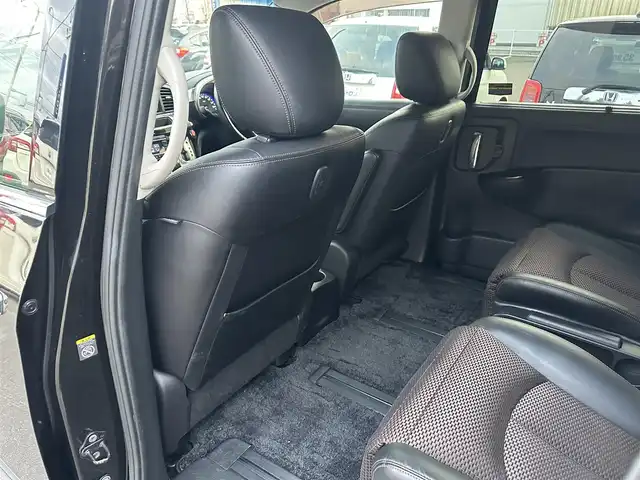 日産 エルグランド 250ハイウェイスター 道北・旭川 2012(平24)年 12.5万km ファントムブラック (株)IDOMが運営する【じしゃロン旭川店】の自社ローン専用車両になります。こちらは現金またはオートローンご利用時の価格です。自社ローンご希望の方は別途その旨お申付け下さい/　/・純正ナビ(CD/DVD/BT/SD/フルセグ)/・バックカメラ/・ETC/・両側パワースライドドア/・電動格納ウィンカーミラー/・フロントデアイサー/・リアデフォッガー/・オートライト/・プッシュスタート/・スマートキー1個/・フォグランプ/・現車装着スタッドレスタイヤ 純正AW225/60R17/・取扱説明書