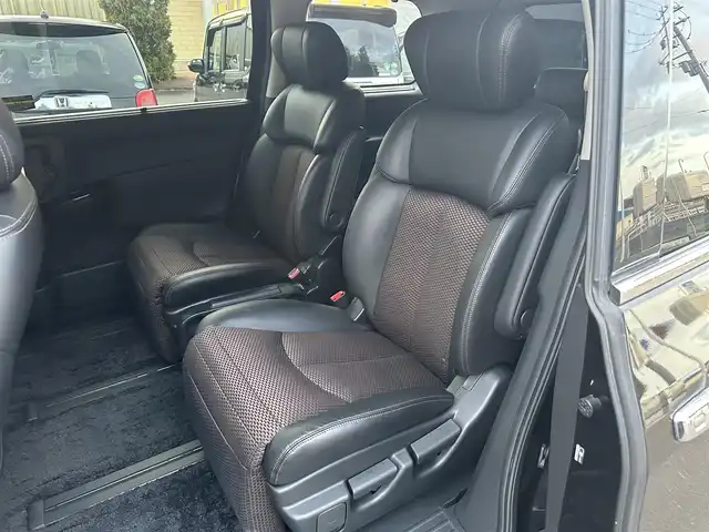 日産 エルグランド 250ハイウェイスター 道北・旭川 2012(平24)年 12.5万km ファントムブラック (株)IDOMが運営する【じしゃロン旭川店】の自社ローン専用車両になります。こちらは現金またはオートローンご利用時の価格です。自社ローンご希望の方は別途その旨お申付け下さい/　/・純正ナビ(CD/DVD/BT/SD/フルセグ)/・バックカメラ/・ETC/・両側パワースライドドア/・電動格納ウィンカーミラー/・フロントデアイサー/・リアデフォッガー/・オートライト/・プッシュスタート/・スマートキー1個/・フォグランプ/・現車装着スタッドレスタイヤ 純正AW225/60R17/・取扱説明書