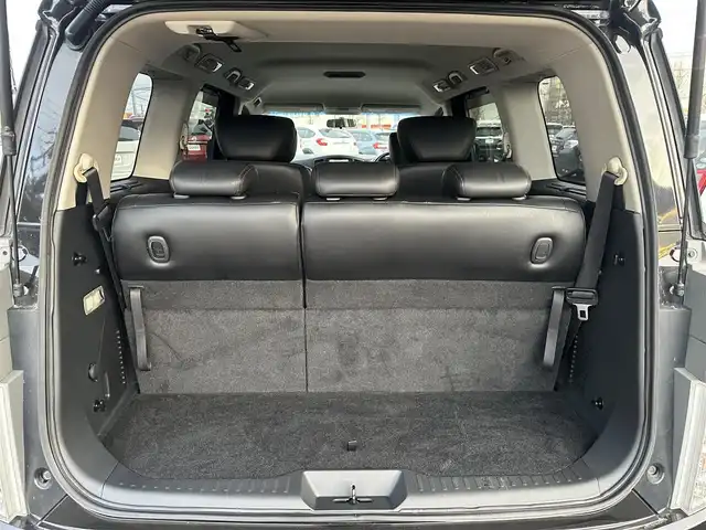 日産 エルグランド 250ハイウェイスター 道北・旭川 2012(平24)年 12.5万km ファントムブラック (株)IDOMが運営する【じしゃロン旭川店】の自社ローン専用車両になります。こちらは現金またはオートローンご利用時の価格です。自社ローンご希望の方は別途その旨お申付け下さい/　/・純正ナビ(CD/DVD/BT/SD/フルセグ)/・バックカメラ/・ETC/・両側パワースライドドア/・電動格納ウィンカーミラー/・フロントデアイサー/・リアデフォッガー/・オートライト/・プッシュスタート/・スマートキー1個/・フォグランプ/・現車装着スタッドレスタイヤ 純正AW225/60R17/・取扱説明書