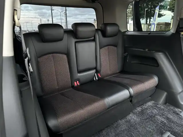 日産 エルグランド 250ハイウェイスター 道北・旭川 2012(平24)年 12.5万km ファントムブラック (株)IDOMが運営する【じしゃロン旭川店】の自社ローン専用車両になります。こちらは現金またはオートローンご利用時の価格です。自社ローンご希望の方は別途その旨お申付け下さい/　/・純正ナビ(CD/DVD/BT/SD/フルセグ)/・バックカメラ/・ETC/・両側パワースライドドア/・電動格納ウィンカーミラー/・フロントデアイサー/・リアデフォッガー/・オートライト/・プッシュスタート/・スマートキー1個/・フォグランプ/・現車装着スタッドレスタイヤ 純正AW225/60R17/・取扱説明書