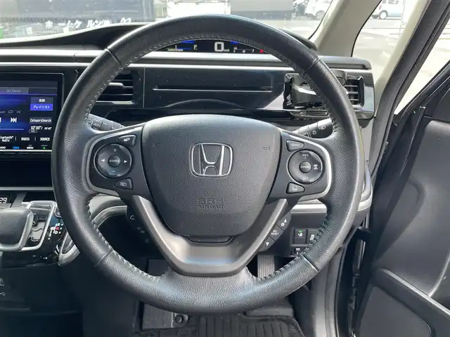 ホンダ ステップワゴン スパーダ ハイブリッド G EX ホンダセンシング 滋賀県 2019(平31)年 4.7万km モダンスティールM 純正メモリーナビ/【Bluetooth/CD/DVD/USB/フルセグ】/両側パワースライドドア/・ハンズフリー左スライドドア/バックカメラ/ハーフレザーシート/シートヒーター/LEDヘッドライト/フォグライト/純正１６AW/ビルトインETC/スマートキー/ドライブレコーダー