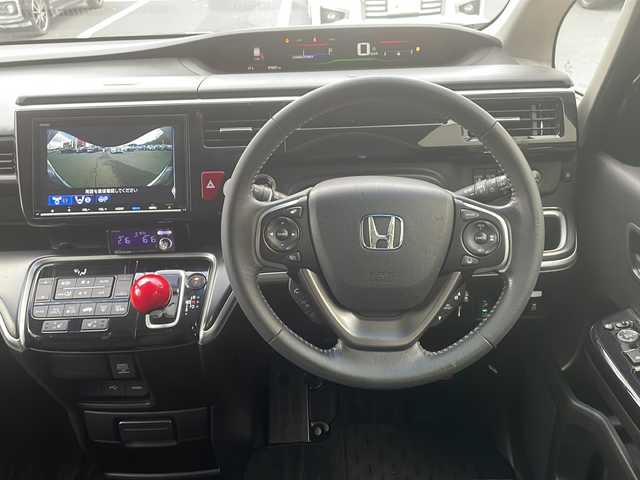 ホンダ ステップワゴン スパーダ ハイブリッド G EX ホンダセンシング 京都府 2018(平30)年 7.9万km プレミアムディープロッソパール 純正９インチナビ　Ｂｌｕｅｔｏｏｔｈオーディオ　ＤＶＤ再生　ＨＤＭＩ　ＵＳＢ　マルチビューモニター　後席フリップダウンモニター　両側パワースライド　アダプティブクルーズコントロール　車高調　ＬＥＤヘッドライト　スマートキー　前後ドライブレコーダー