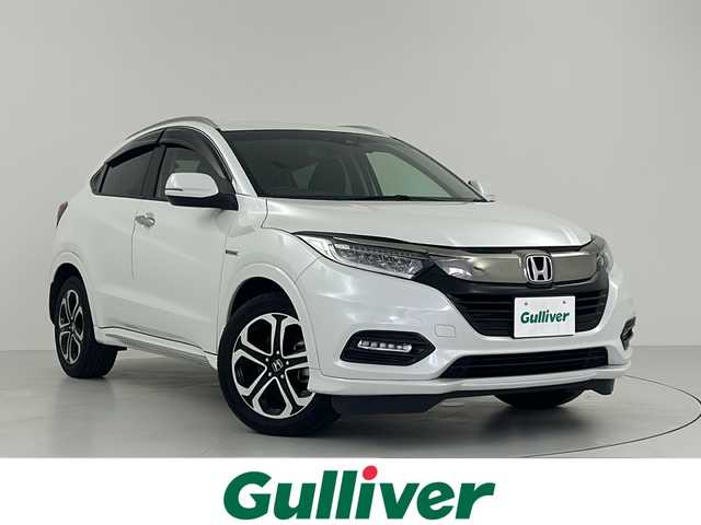 ホンダ ヴェゼル ハイブリッド Z ホンダセンシング 大阪府 2019(令1)年 2.5万km プラチナホワイトパール 純正８インチナビ/   フルセグTV/CD/DVD/USB/衝突軽減/バックモニター/前席シートヒーター/レーダークルーズコントロール/前後ドライブレコーダー/純正フロアマット/プッシュスタート/スマートキー/ＥＴＣ/ＬＥＤライト/禁煙車