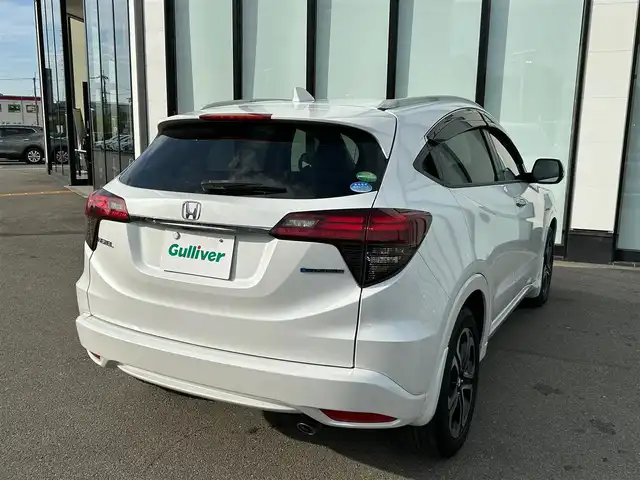 ホンダ ヴェゼル ハイブリッド Z ホンダセンシング 大阪府 2019(令1)年 2.5万km プラチナホワイトパール 純正８インチナビ/   フルセグTV/CD/DVD/USB/衝突軽減/バックモニター/前席シートヒーター/レーダークルーズコントロール/前後ドライブレコーダー/純正フロアマット/プッシュスタート/スマートキー/ＥＴＣ/ＬＥＤライト/禁煙車