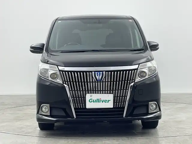 トヨタ エスクァイア ハイブリッド Gi 群馬県 2014(平26)年 8万km ブラック 純正９型ナビ　純正１１型後席モニター　バックカメラ　クルーズコントロール　シートヒーター　両側パワースライドドア　ＬＥＤヘッドライト　ＥＴＣ　純正アルミホイール１５インチ　オートライト　禁煙車