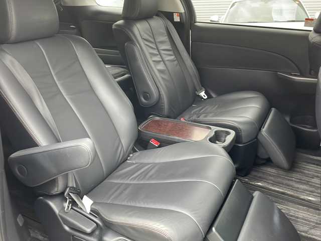 トヨタ エスティマ ハイブリッド アエラス レザーパッケージ 東京都 2014(平26)年 3.6万km ホワイトパールクリスタルシャイン 新車時保証書　/取扱説明書　ナビ説明書/TRDフロントスポイラー/モデリスタフロントグリル/純正メーカーナビ/フルセグTV【走行中映ります】/CD/DVD/REC/USB/AUX/フリップダウンモニター/バックカメラ　ETC/ドライブレコーダー【前後】/レザーシート/シートヒーター/運転席パワーシート/両側パワースライドドア/パワーバックドア/電動床下格納シート/コーナーセンサー/HIDライト/オートライト/Egプッシュスタート/ ストップボタン/スマートキー×2本/クルーズコントロール/社外ホーン【純正積込】/純正17インチアルミ