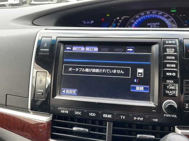 トヨタ エスティマ ハイブリッド アエラス レザーパッケージ 東京都 2014(平26)年 3.6万km ホワイトパールクリスタルシャイン 新車時保証書　/取扱説明書　ナビ説明書/TRDフロントスポイラー/モデリスタフロントグリル/純正メーカーナビ/フルセグTV【走行中映ります】/CD/DVD/REC/USB/AUX/フリップダウンモニター/バックカメラ　ETC/ドライブレコーダー【前後】/レザーシート/シートヒーター/運転席パワーシート/両側パワースライドドア/パワーバックドア/電動床下格納シート/コーナーセンサー/HIDライト/オートライト/Egプッシュスタート/ ストップボタン/スマートキー×2本/クルーズコントロール/社外ホーン【純正積込】/純正17インチアルミ