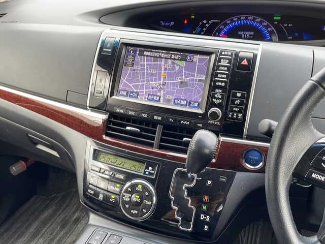 トヨタ エスティマ ハイブリッド アエラス レザーパッケージ 東京都 2014(平26)年 3.6万km ホワイトパールクリスタルシャイン 新車時保証書　/取扱説明書　ナビ説明書/TRDフロントスポイラー/モデリスタフロントグリル/純正メーカーナビ/フルセグTV【走行中映ります】/CD/DVD/REC/USB/AUX/フリップダウンモニター/バックカメラ　ETC/ドライブレコーダー【前後】/レザーシート/シートヒーター/運転席パワーシート/両側パワースライドドア/パワーバックドア/電動床下格納シート/コーナーセンサー/HIDライト/オートライト/Egプッシュスタート/ ストップボタン/スマートキー×2本/クルーズコントロール/社外ホーン【純正積込】/純正17インチアルミ