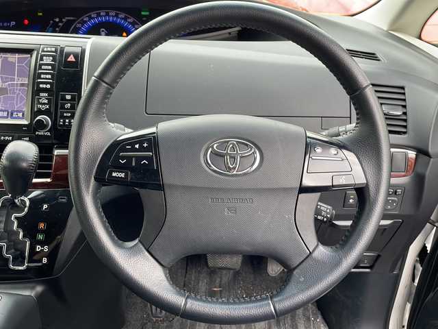 トヨタ エスティマ ハイブリッド アエラス レザーパッケージ 東京都 2014(平26)年 3.6万km ホワイトパールクリスタルシャイン 新車時保証書　/取扱説明書　ナビ説明書/TRDフロントスポイラー/モデリスタフロントグリル/純正メーカーナビ/フルセグTV【走行中映ります】/CD/DVD/REC/USB/AUX/フリップダウンモニター/バックカメラ　ETC/ドライブレコーダー【前後】/レザーシート/シートヒーター/運転席パワーシート/両側パワースライドドア/パワーバックドア/電動床下格納シート/コーナーセンサー/HIDライト/オートライト/Egプッシュスタート/ ストップボタン/スマートキー×2本/クルーズコントロール/社外ホーン【純正積込】/純正17インチアルミ