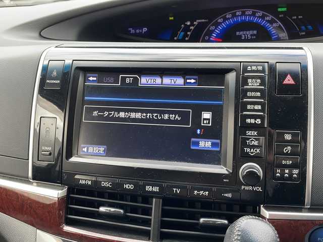 トヨタ エスティマ ハイブリッド アエラス レザーパッケージ 東京都 2014(平26)年 3.6万km ホワイトパールクリスタルシャイン 新車時保証書　/取扱説明書　ナビ説明書/TRDフロントスポイラー/モデリスタフロントグリル/純正メーカーナビ/フルセグTV【走行中映ります】/CD/DVD/REC/USB/AUX/フリップダウンモニター/バックカメラ　ETC/ドライブレコーダー【前後】/レザーシート/シートヒーター/運転席パワーシート/両側パワースライドドア/パワーバックドア/電動床下格納シート/コーナーセンサー/HIDライト/オートライト/Egプッシュスタート/ ストップボタン/スマートキー×2本/クルーズコントロール/社外ホーン【純正積込】/純正17インチアルミ