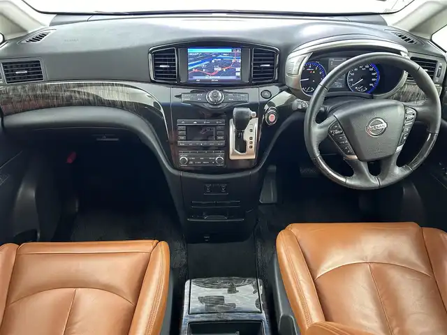 日産 エルグランド 250HWS Sジェットブラック アーバンクロム 大阪府 2021(令3)年 2.1万km ファントムブラック エマージェンシーブレーキ　/フリップダウンモニター/純正メモリナビ/　　CD/DVD/BT/フルセグTV/アラウンドビューモニター/両側パワースライドドア/パワーバックドア/クルーズコントロール/LEDオートライト　/フォグランプ　/レザーシート/パワーシート　/シートヒーター/純正18インチアルミホイール　/車線逸脱防止機能/コーナーセンサー/スマートキー/ETC