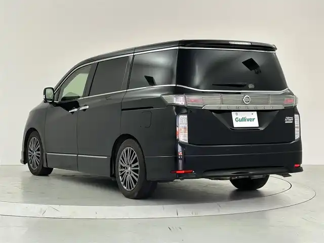 日産 エルグランド 250HWS Sジェットブラック アーバンクロム 大阪府 2021(令3)年 2.1万km ファントムブラック エマージェンシーブレーキ　/フリップダウンモニター/純正メモリナビ/　　CD/DVD/BT/フルセグTV/アラウンドビューモニター/両側パワースライドドア/パワーバックドア/クルーズコントロール/LEDオートライト　/フォグランプ　/レザーシート/パワーシート　/シートヒーター/純正18インチアルミホイール　/車線逸脱防止機能/コーナーセンサー/スマートキー/ETC