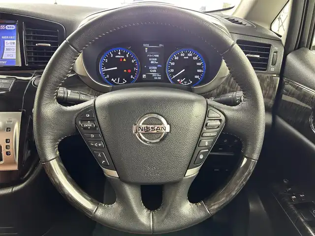 日産 エルグランド 250HWS Sジェットブラック アーバンクロム 大阪府 2021(令3)年 2.1万km ファントムブラック エマージェンシーブレーキ　/フリップダウンモニター/純正メモリナビ/　　CD/DVD/BT/フルセグTV/アラウンドビューモニター/両側パワースライドドア/パワーバックドア/クルーズコントロール/LEDオートライト　/フォグランプ　/レザーシート/パワーシート　/シートヒーター/純正18インチアルミホイール　/車線逸脱防止機能/コーナーセンサー/スマートキー/ETC