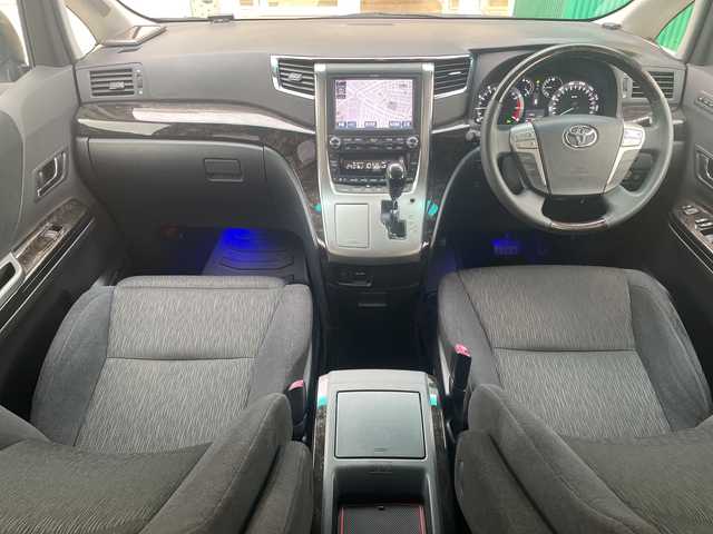 トヨタ ヴェルファイア 2．4Z Gエディション 青森県 2014(平26)年 9.6万km ホワイトパールクリスタルシャイン 4WD/純正メーカーHDDナビ・フルセグTV/CD・DVD・Bluetooth・USB/OPプレミアムサウンド18スピーカー/OPリアエンターテイメントシステム/純正9インチ後席モニター/OPパノラミックビューモニター/前席パワーシート/両側パワースライドドア/パワーバックドア/クルーズコントロール/クリアランスソナー/ワイパーデアイサー/社外ドラレコ一体型デジタルインナーミラー/ビルトインETC/AC100V100W/純正エンジンスターター/HIDヘッドライト/HIDフォグランプ/純正18インチアルミ/モデリスタフロントグリル