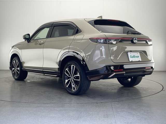 ホンダ ヴェゼル ハイブリッド e:HEV Z 宮崎県 2021(令3)年 3.6万km サンドカーキパール 禁煙車/ホンダセンシング/純正8型ナビTV/（VXM-215VFEi/CD/DVD/Bluetooth/フルセグTV)/純正バックカメラ/純正ドライブレコーダー/純正ETC/純正エアロ/純正18インチアルミ/純正LEDオートライト/純正LEDフォグ/純正フロアマット/アダプティブクルーズコントロール/レーンディパーチャーアラート/オートマチックハイビーム/ブラインドスポットモニター/ダウンヒルアシストコントロール/クリアランスソナー/電子パーキング/オートホールド/パワーバックドア/デュアルオートエアコン/前席シートヒーター/ステアリングヒーター/スマートキー/プッシュエンジンスタート/新車時保証書/取扱い説明書