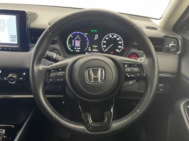 ホンダ ヴェゼル ハイブリッド e:HEV Z 宮崎県 2021(令3)年 3.6万km サンドカーキパール 禁煙車/ホンダセンシング/純正8型ナビTV/（VXM-215VFEi/CD/DVD/Bluetooth/フルセグTV)/純正バックカメラ/純正ドライブレコーダー/純正ETC/純正エアロ/純正18インチアルミ/純正LEDオートライト/純正LEDフォグ/純正フロアマット/アダプティブクルーズコントロール/レーンディパーチャーアラート/オートマチックハイビーム/ブラインドスポットモニター/ダウンヒルアシストコントロール/クリアランスソナー/電子パーキング/オートホールド/パワーバックドア/デュアルオートエアコン/前席シートヒーター/ステアリングヒーター/スマートキー/プッシュエンジンスタート/新車時保証書/取扱い説明書