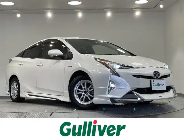 トヨタ プリウス Sセーフティプラス 愛知県 2018(平30)年 6.6万km ホワイトパールクリスタルシャイン 純正９インチナビ（NSZT-Y66T）/（Bluetooth/フルセグTV/SD/FM/AM/CD・DVD再生）/モデリスタエアロ　/トヨタセーフティセンス　/　　-プリクラッシュセーフティ/　　-レーンディパーチャーアラート/　　-レーダークルーズコントロール　/　　-オートマチックハイビーム/パーキングアシスト　/ビルトインＥＴＣ　/ＬＥＤヘッドライト/LEDフォグランプ　/バックカメラ　/クリアランスソナー　/横滑り防止/純正フロアマット　