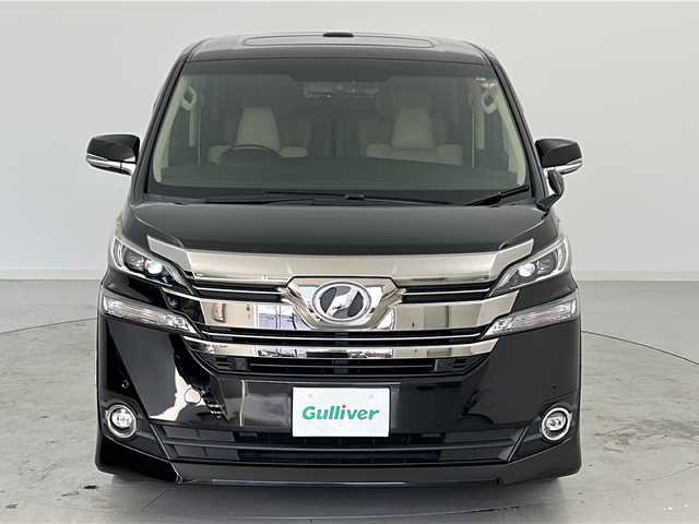 トヨタ ヴェルファイア VL 宮城県 2015(平27)年 13.7万km ブラック ツインムーンルーフ/純正フリップダウンモニター/JBLサウンド/モデリスタエアロ（サイド、リア）/トヨタセーフティーセンス/・クルーズコントロール/・オートマチックハイビーム/・クリアランスソナー/純正11型ナビ/（BT.SD.CD.DVD.AM.FM）/フルセグTV/バックカメラ/電動リアゲート/両側パワースライドドア/全席パワーシート/前席シートヒーター/ビルトインETC/純正ドラレコ（F）/電動リアゲート/社外全周囲ドラレコ/レザーシート/オットマン/3列シート/ウッドコンビステアリング/ステアリングスイッチ/プッシュスタート/スマートキー（2本）/純正フロアマット/ドアバイザー/社外20インチアルミホイール/18インチアルミホイール冬タイヤ積込/LEDヘッドライト/LEDフォグランプ