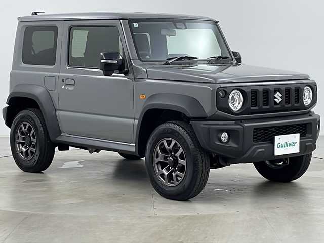 スズキ ジムニー シエラ JC 道央・札幌 2025(令7)年 0.2万km ミディアムグレー ・4WD/・寒冷地仕様/・9インチディスプレイオーディオ/・BT&AndroidAuto&AppleCarPlay/・バックカメラ/・スズキセーフティーサポート/・クルーズコントロール/・前席シートヒーター/・ミラーヒーター/・ダウンヒルアシストコントロール/・オートマチックハイビーム/・オートライト/・LEDヘッドライト&フォグ/・ヘッドライトウォッシャー/・プッシュスタート/・スマートキー/・保証書/・取扱説明書