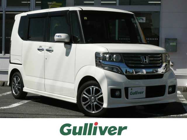 ホンダ Ｎ ＢＯＸ カスタム G SSパッケージ 大分県 2014(平26)年 10万km プレミアムホワイトパール ワンオーナー/Gathers SDナビ:VXM-145Vsi/（CD/DVD/BT/SD/ワンセグTV）/安心パッケージ　/・シティブレーキアクティブシステム/・カーテンエアバック/・サイドエアバック/純正フロアマット　ドアバイザー/ETC/オートライト/バックカメラ/両側パワースライドドア/ステアリングリモコン/HIDヘッドライト/フロントフォグランプ/アイドリングストップ/保証書　取扱説明書　スペアキー1本