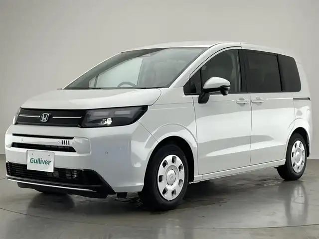 ホンダ フリード ハイブリット e:HEV AIR 愛知県 2025(令7)年 0.1万km プラチナホワイトパール ホンダコネクトナビ装着用ＰＫＧ　禁煙車　両側電動スライド　ホンダセンシング　衝突軽減　オートハイビーム　追従クルコン　誤発進抑制　ＬＥＤヘッドライト　コーナーセンサー　プッシュスタート　スマートキー　電子パーキング　ブレーキホールド　カーテンエアバッグ