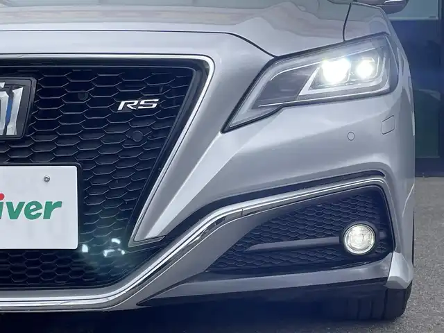 トヨタ クラウン ハイブリッド RS 和歌山県 2021(令3)年 2.5万km シルバーM 純正12.3インチナビ/バックカメラ/フルセグTV/BT/CD/衝突軽減ブレーキ/ブラインドスポットモニター/レーンキープアシスト/レーダークルコン/オートライト/前後コーナーセンサー/ビルトインETC2.0 /シートヒーター/パワーシート/ステアリングリモコン/ステアリングヒーター/フルオートパワーウィンドウ/LEDヘッドライト/フォグランプ/ドアバイザー